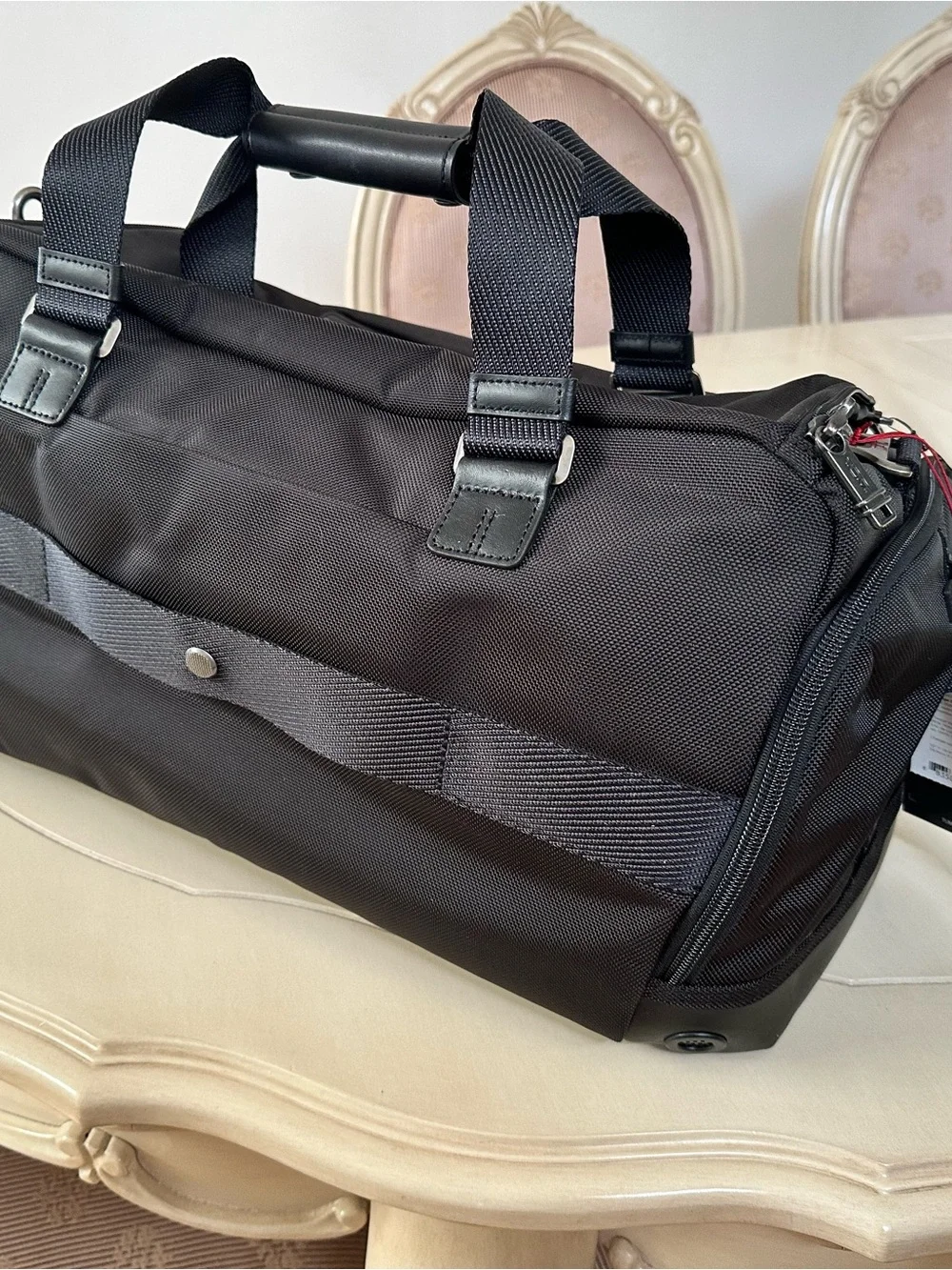 Tumi stylish practical
